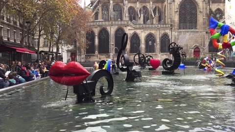 Paris, France - 25 November, 2014: The Stravinsky fountain, or Fountain of the robot, was created in 1983 by Jean Tinguely and Niki de Saint Phalle.