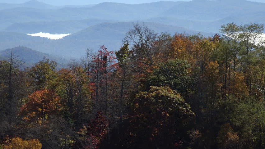 Zoom of view from overlook on Blue Ridge Parkway road near Asheville, NC, USA