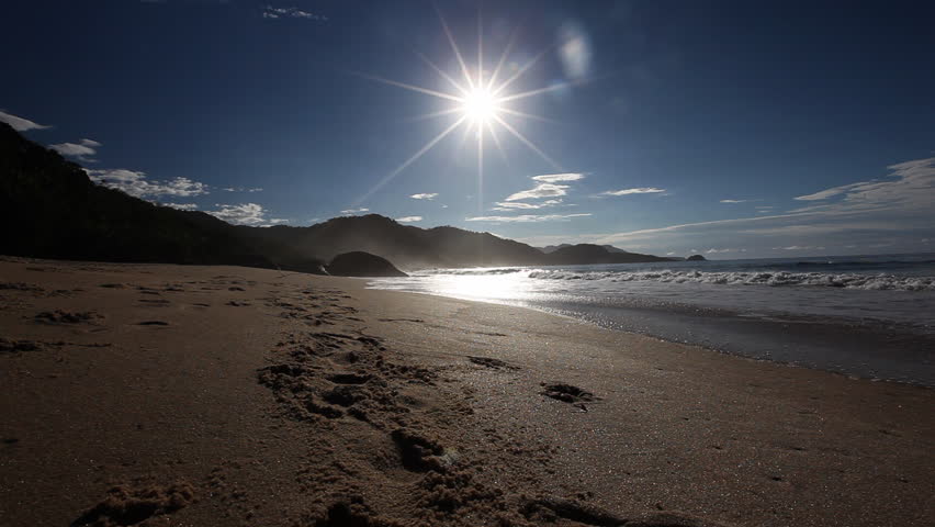 A gorgeous beach in Bahia, Brazil with sun rising over it 