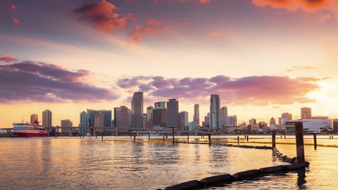 Miami skyline at sunset with clouds passing by