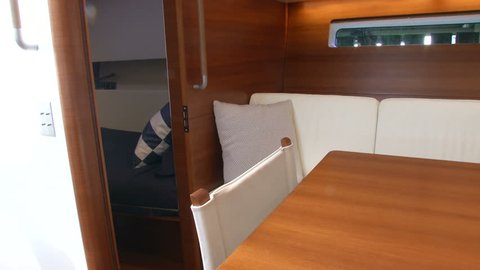 Dinner table on dining room of a luxury sailing boat
