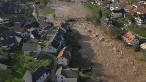 AERIAL: Big river flooding the suburbs after heavy rain