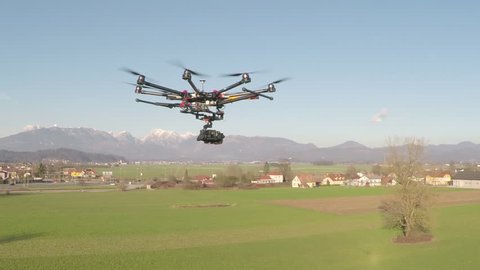 AERIAL: Big octocopter flying and filming