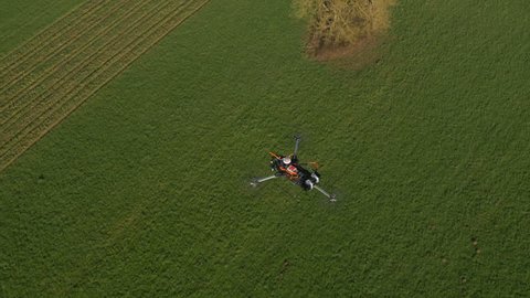 AERIAL: Drone with camera flying above the fields