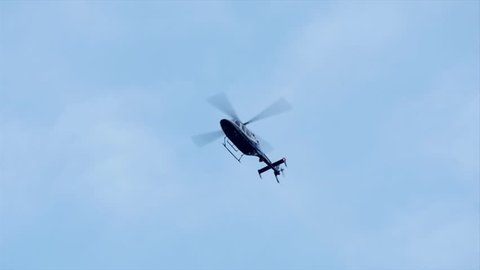 helicopter flying background. slow motion. chopper in flight. aircraft airborne