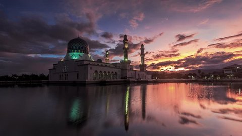 Time lapse of sunrise and scattered clouds at Likas Mosque(Masjid Bandaraya Likas), Kota Kinabalu, Sabah, Malaysia. 4K resolution, 4096x2304.