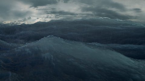rough sea rain loop of big waves in an agitated ocean. Camera goes underwater several times, 4k Great background for movie credits or intro. (seamless loop, 4k,ultra high definition, 3840 X 2160)