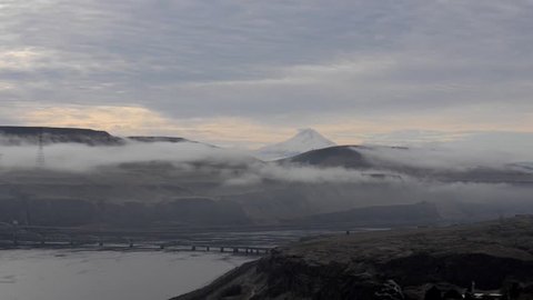 Columbia River near Wishram with Mt Hood at cloudy sunset