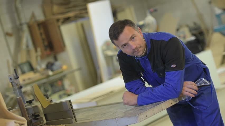 Portrait of carpenter in workshop