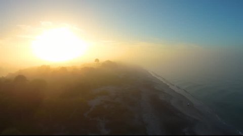 Aerial Dawn over ancient Capersen Beach, Venice Florida. Famous for prehistoric sharks teeth that beach combers find in the surf. 