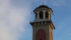 TIRANA, ALBANIA - 8 JANUARY 2015 Belfry tower of the orthodox church in Kavaja Street in Tirana. Blue sky with white clouds in the evening. Static