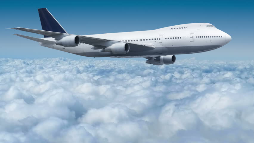 Aircraft Boeing 747 flying over the clouds cinema graph Royalty-Free Stock Footage #8451238