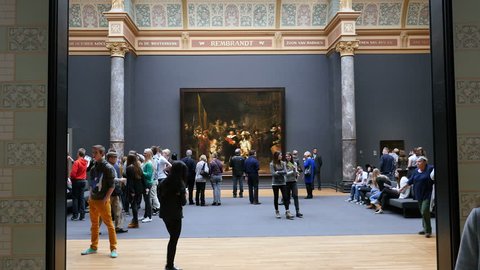 November, 17, 2014. Rijksmuseum, Amsterdam, the Netherlands.The room at the Rijksmuseum in Amsterdam with the world famous Night Watch by Rembrandt and vistors. Wide shot.