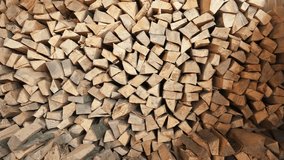 Pile of chopped fire wood prepared for winter - dolly motion