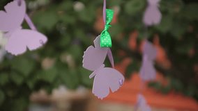 Hanging  paper butterflies outdoor