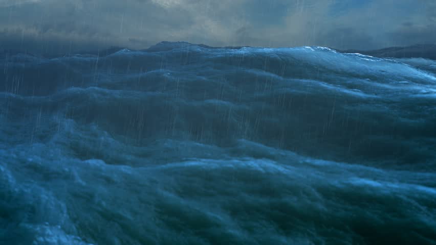 rough sea rain loop of big waves in an agitated ocean. Camera goes underwater several times, 4k Great background for movie credits or intro. (seamless loop, 4k,ultra high definition, 3840 X 2160) Royalty-Free Stock Footage #8482042