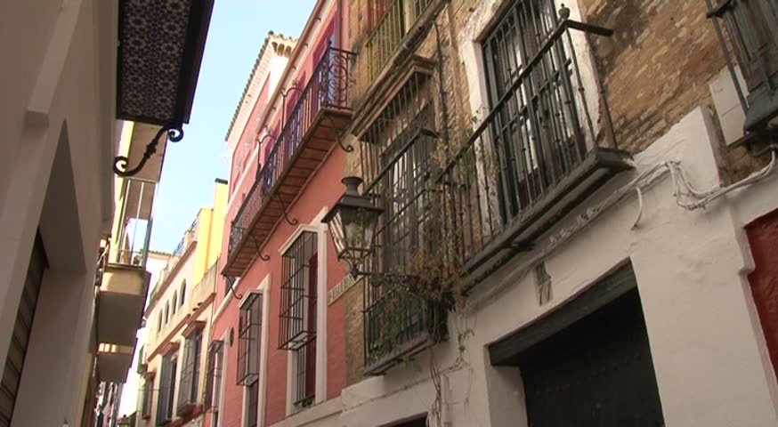 Old house and street in Seville, Spain