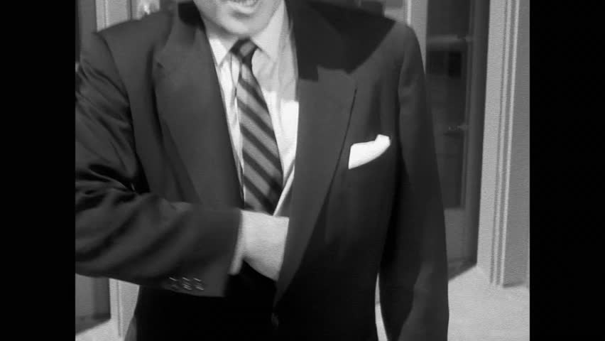 Man removing gun from jacket and shooting