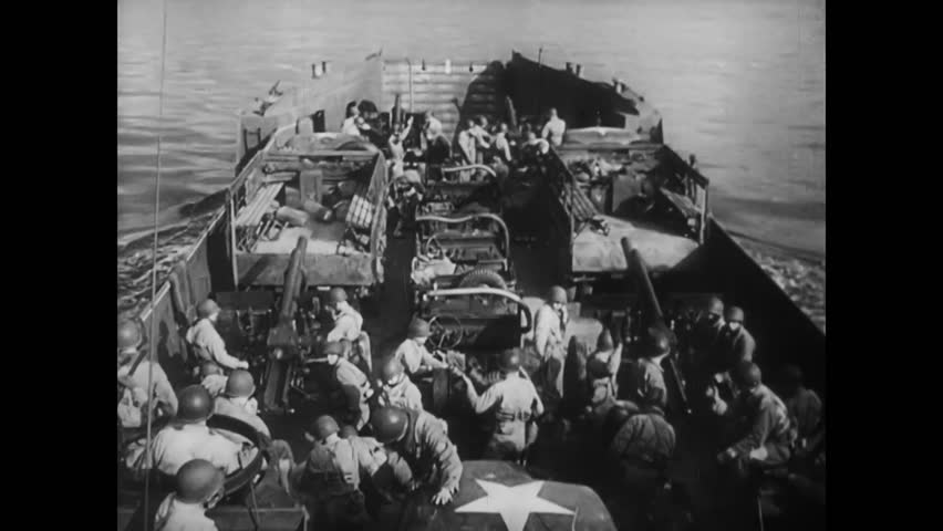 Soldiers firing weapons from battleship, World War II