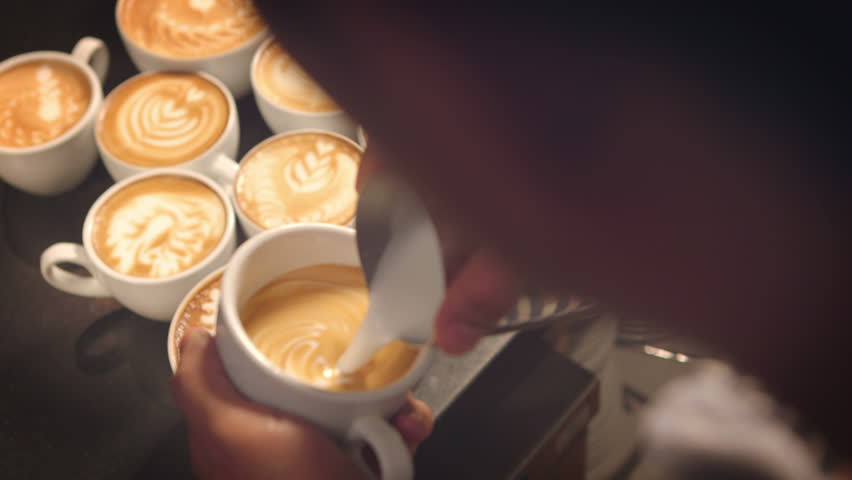 Barista prepares latte in take away cup | Shutterstock HD Video #8494420