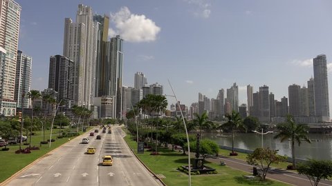 Panama City, Central America. View of the skyline and sea, with cars and urban traffic along Avenida Balboa and Cinta Costera