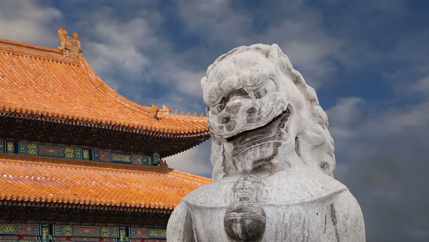 Stone Guardian Lion Statue in Beihai Park -- is an imperial garden to the northwest of the Forbidden City in Beijing, China 
