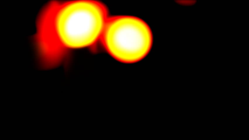 Close up of torch and blurred fire bubbles in red and yellow colors in