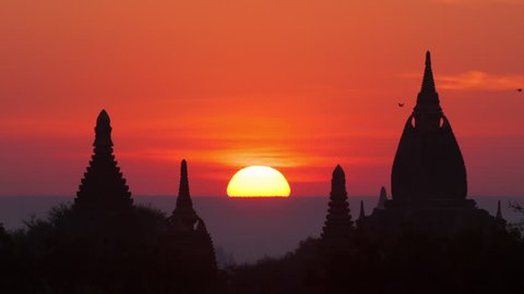 Bagan Myanmar (Burma) - Balloons at sunrise over ancient pagodas and temples 