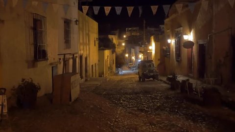 Old willy parked on a beautiful colonial city by night, Real de Catorce, Mexico