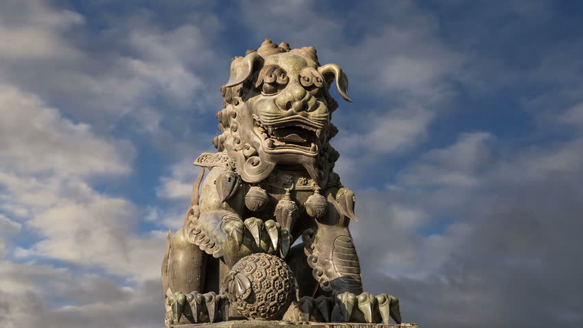 Bronze Guardian Lion Statue in Yonghe Temple (Lama Temple) in Beijing, China  