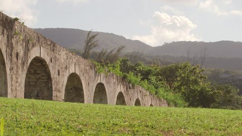 Ancient aqueduct Montego Bay, Jamaica - Located along Jamaican shores between the majestic Blue Mountains and Caribbean Sea