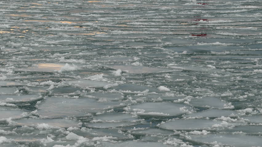 Scenic Harbor With Ice Glazed Pier and Lighthouse. Algoma, Wisconsin. 