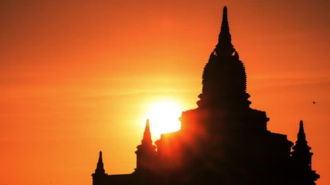 Time lapse of amazing sunrise over ancient Buddhist Temple silhouette at Bagan. Myanmar (Burma) travel landscape and destinations