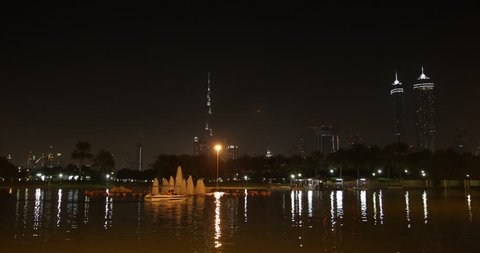 Night Evening Illuminated Lights Safa Park Dubai Skyline Burj Khalifa Boat Ride ( Ultra High Definition, UltraHD, Ultra HD, UHD, 4K, 2160P, 4096x2160 )