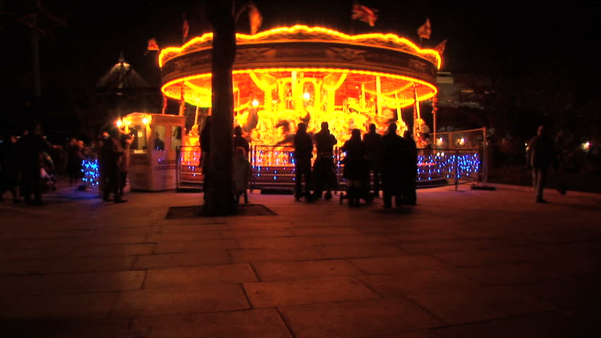Fairground carousel at night in London at Christmas