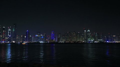 night view of Dubai skyscraper in United Arab Emirates UAE, shoting Palm island