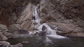 Waterfall near the settlement of Khuchni. Russia. Republic of Dagestan. Winter.