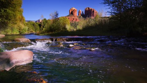 Sedona, Cathedral Rock. Landscape with the river. Pure transparent water, slow motion.