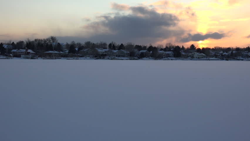 View of Frozen Lake in Sunset/ A beautiful landscape of frozen lake in sunset.