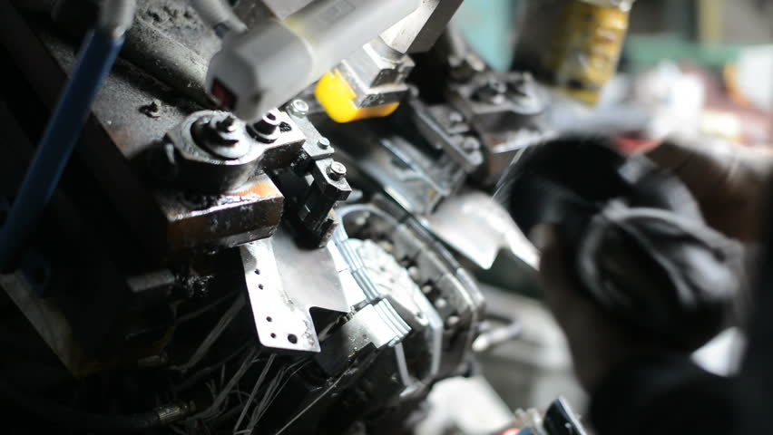 Shoemaking machinery in the busy work in Shoe factory.