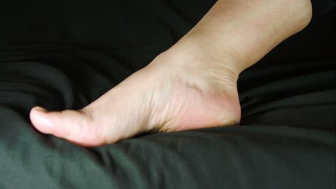 Woman Massaging Her Foot With Numbing Cream, Pain, Rheumatism, Injury