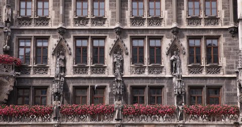 Flowers Detail Front Facade Main Entrance Kings Statues Munich New Town Hall Day ( Ultra High Definition, UltraHD, Ultra HD, UHD, 4K, 2160P, 4096x2160 )
