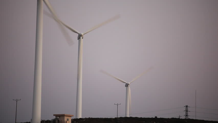 Close up of a wind power machine in three different shots