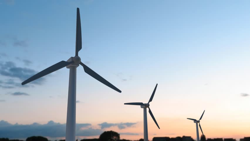 Loop animation, Wind turbines, Shape like windmills, are mounted on a tower to capture the wind energy for conversion of kinetic energy to electricity, which is clean and environment pollution free.
