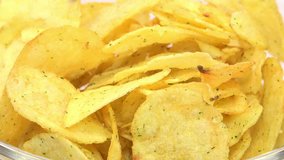 Potato Chips in Glass Bowl Zooming Out. 4K Ultra HD 3840x2160 Video Clip