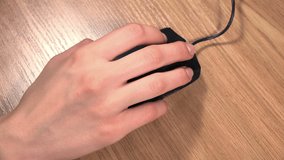 Female Hand Using a Computer Mouse. 4K Ultra HD 3840x2160 Video Clip