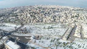 aerial shot of  snow in Jerusalem , form the Mount Scopus lookout area - 2.7K
 go-pro pro-tune raw file, high bit-rate
shot from a drone with a electronic stabilizer and  go-pro 4 camera.