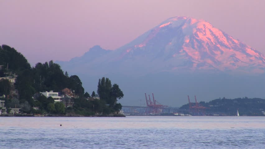 The last light of the day falls on Mt. Rainier from Discovery Park.