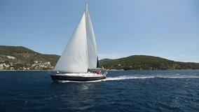  Clips set: Sailing in the wind through the waves. Sailing boat shot in full HD at the Mediteranean sea.