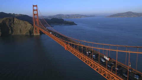 Aerial overhead view Scenic Highway US 101 crossing Golden Gate Bridge vehicle traffic Marin Headland San Francisco California USA 4K